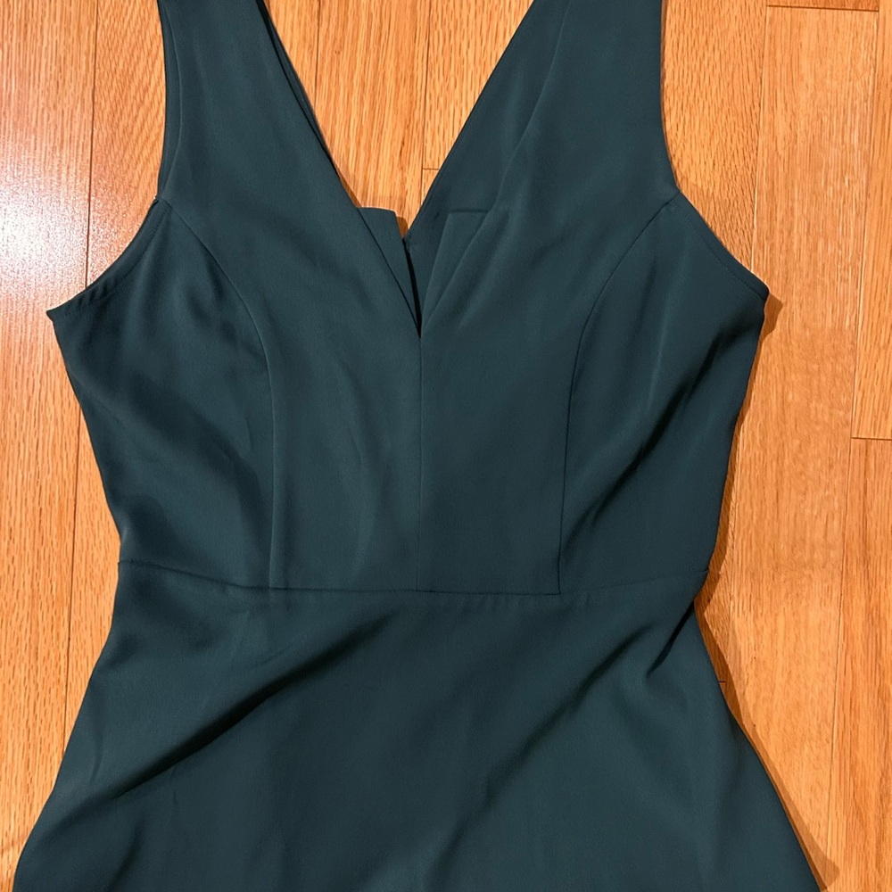 Elegant Dark Green Sleeveless Peplum shirt
